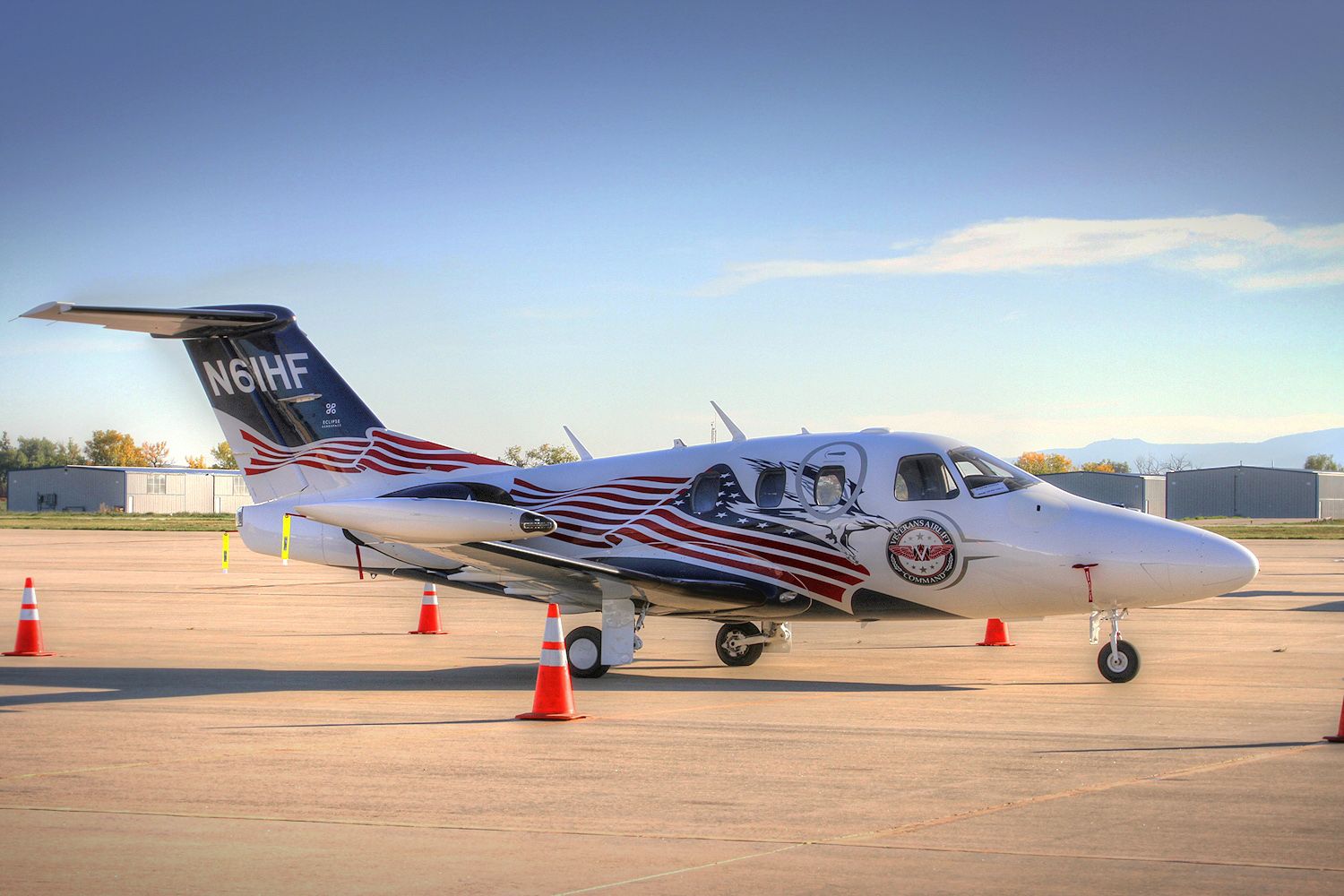 Eclipse 500 (N61HF) - Heroflight Eclipse Jet. You just cant go wrong with that paint scheme. In town along with N800EJ to race a Lexus LFA 10/8/12 (the Lexus won) then off to PSP for the 2012 AOPA Expo.