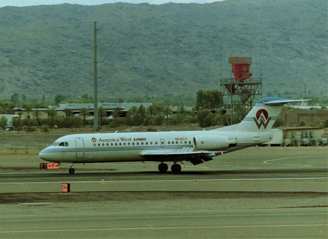 N528YV — - KPHX - Fokker 70 of Mountain West Airlines DBa America West Express arriving Phoenix July 1995 - I have no clue where this arrived from. MWA used this jet for about 2 years.