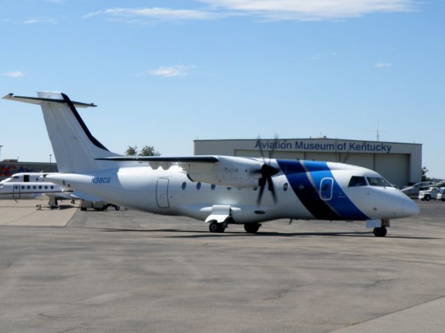 Fairchild Dornier 328 (N38CG) - A Dornier 328 taxis to the active at Blue Grass airport (KLEX)...