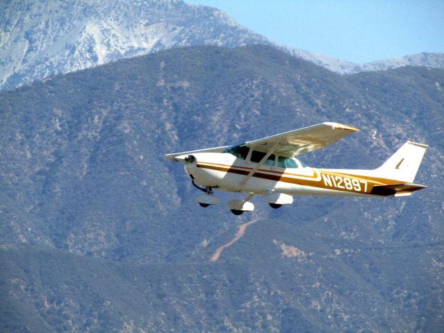 Cessna Skyhawk (N12897) - Taking off RWY 26R