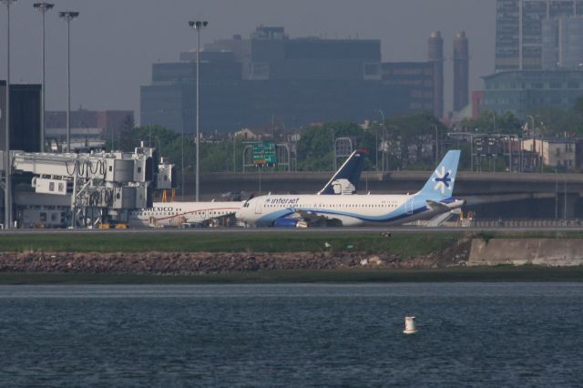 Airbus A320 (XA-EBA) - Interjet A320 (XA-EBA) parked along side other Mexican carrier Aeromexico B737-800 (XA-AML) both diversions from JFK due to weather on 05/15/18. 