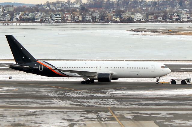 BOEING 767-300 (G-POWD) - Shamrock 992 getting tugged from the North Cargo area to the gate at Terminal C