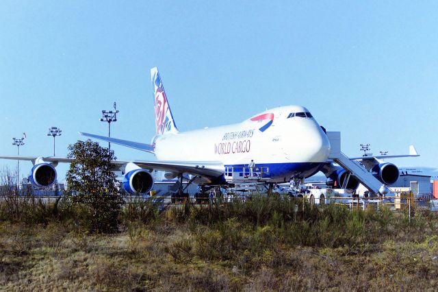 Boeing 747-400 (N495MC) - KPAE - fresh out of the paint factory April 1999 at Boeing Everett, this jet had 'operated by Atlas Air" on the nose area. I risked getting a ticket on Hwy 525 stopping and taking photos, then I pulled up into the old Boeing Everett Tour parking lot to get this. The paint was gleaming and super sharp though the sunlight didn't help.