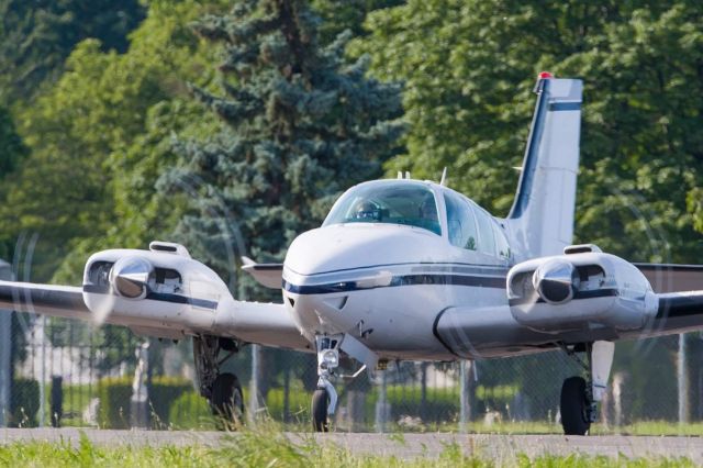 Beechcraft 55 Baron (N4LP) - Kelsey and I pose our Baron.