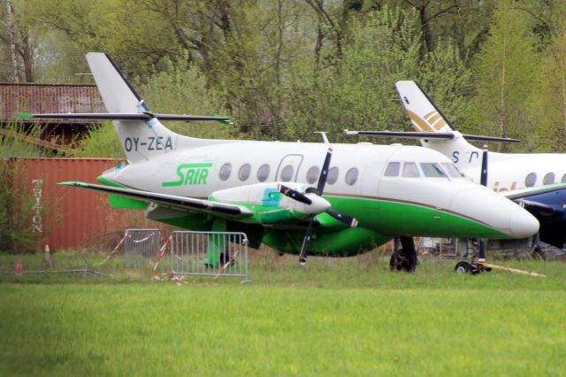 British Aerospace Jetstream Super 31 (OY-ZEA) - In storage here on 20-Apr-23 wearing the colours of S-Air Salzburg and the registration of FlexFlight, neither of which were taken up and is still current as G-ISLC.