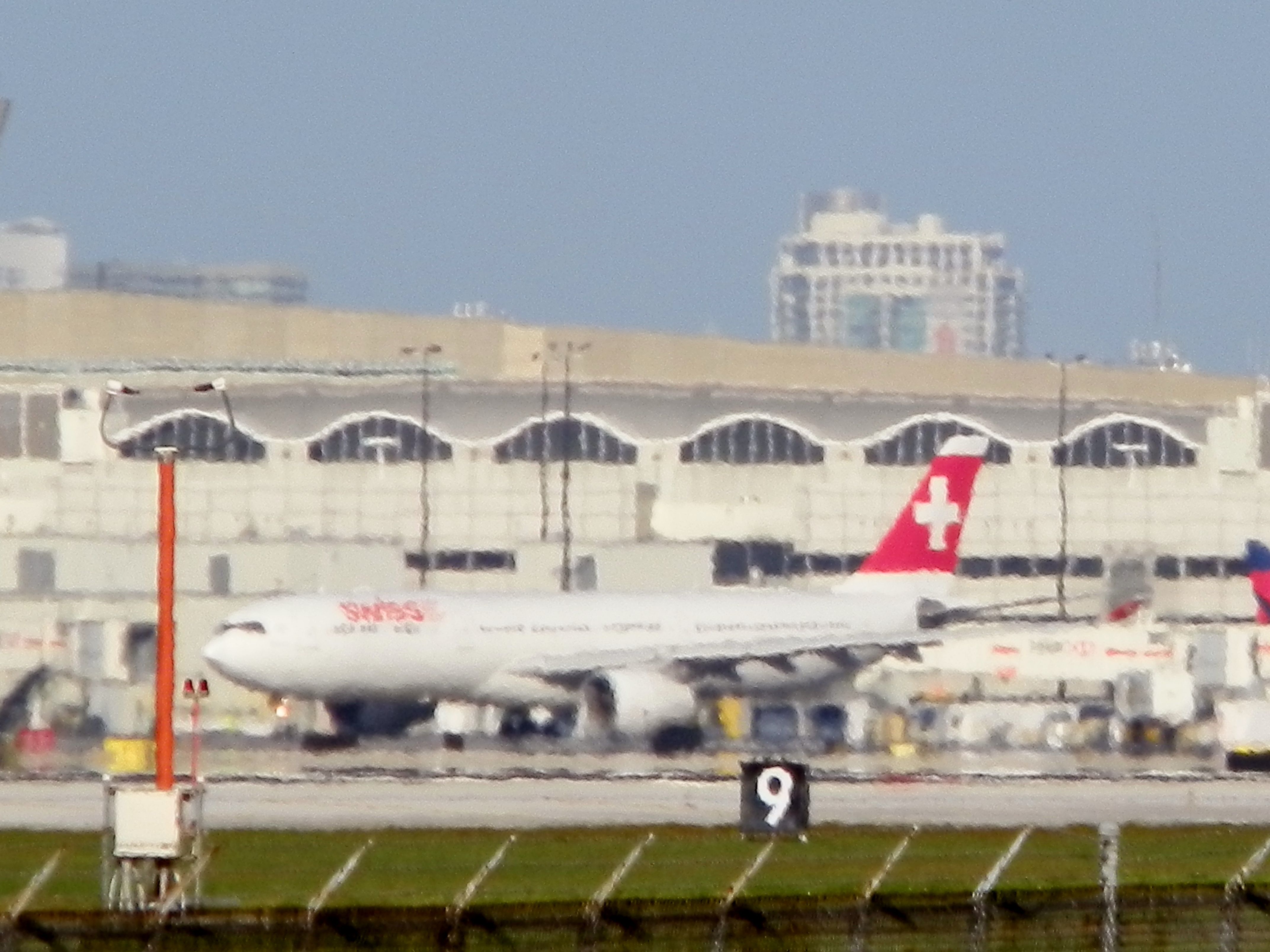 Airbus A330-300 (HB-JHC) - A Swiss A330-300 Departing for Zurich Kloten"You can see the heat rising"From the tarmac!"