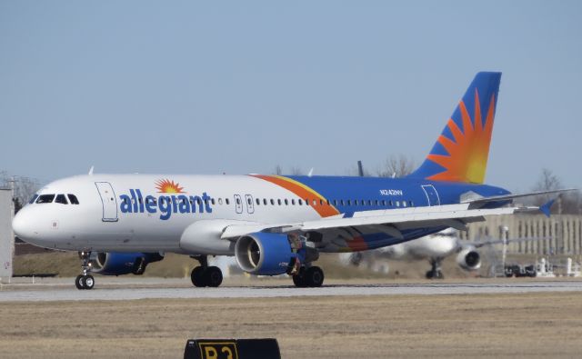 Airbus A320 (N242NV) - An Allegiant Air Airbus A320 arrives on a charter flight from Dayton Ohio. The aircraft would depart an hour later for Daytona Beach. 