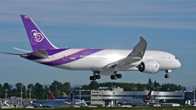 Boeing 787-8 (HS-TQC) - BOE590 on final to Rwy 16R to complete its maiden flight test on 10/9/14. (LN:226 / cn 36110). Note the livery is only partially completed.