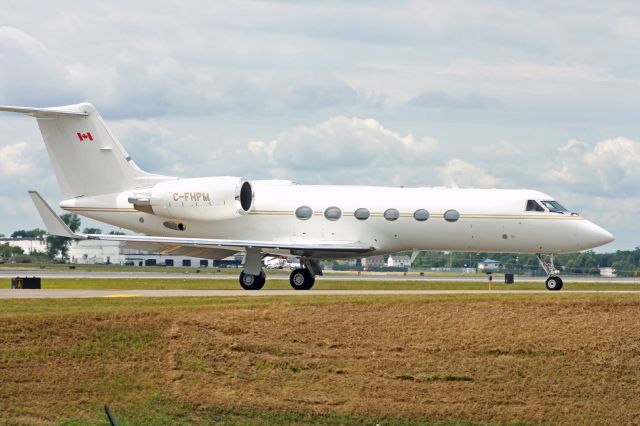 Gulfstream Aerospace Gulfstream IV (C-FHPM) - Standing at Mercy Flight building by taxiway next to runway 5/23.
