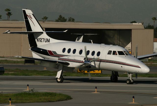 British Aerospace Jetstream 31 (N127UM) - Turning off 12 and delta 3 at Long Beach.