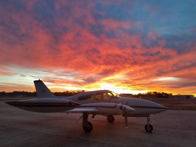 Cessna 310 — - Beautiful sunrise at KTYR