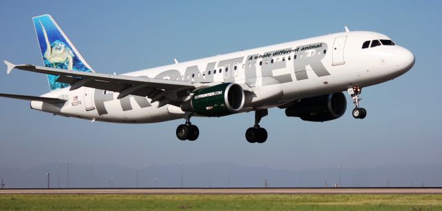 Airbus A320 (N210FR) - Arriving on 35L.