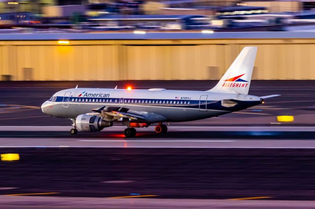 Airbus A319 (N745VJ) - American Airlines A319 in Allegheny retro livery landing at PHX on 12/9/22. Taken with a Canon R7 and Tamron 70-200 G2 lens.