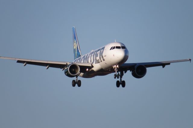 Airbus A320 (N210FR) - Taken Nov. 26, 2014 from airport overlook., coming in on 18C