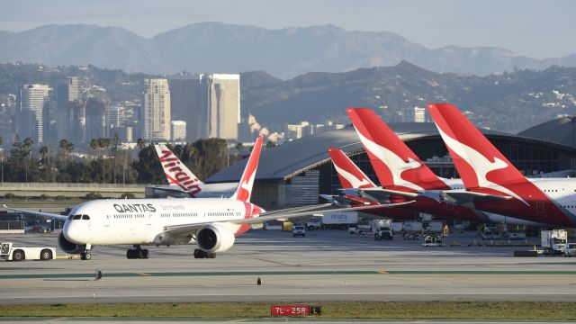 Boeing 787-9 Dreamliner (VH-ZNC) - Getting towed to parking at LAX.