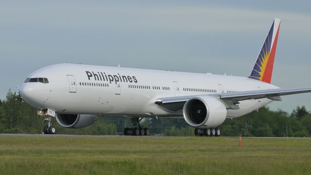 BOEING 777-300 (RP-C7775) - BOE991 (LN:1022) begins a fast taxi test on runway 34L on 6/15/12.