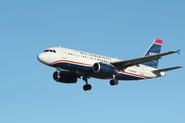 Airbus A319 (N821AM) - Just messing around with some AI Servo Focus settings.  Seems to work pretty good. My friend Bill Sorrells is in the window 4th from the rear on this side of the plane.