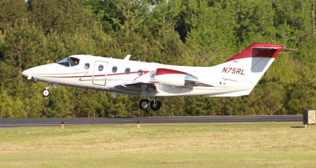 Beechcraft Beechjet (N75RL) - A Beechcraft Beechjet 400A departing Boswell Field, Talladega Municipal Airport, AL, following the NASCAR GEICO 500 race at Talladega Super Speedway - late afternoon, April 25, 2021.