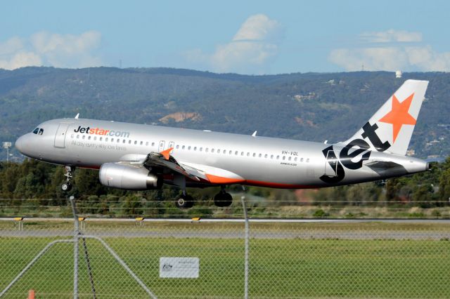 Airbus A320 (VH-VQL) - About to put down on runway 05. Wednesday, 21st May 2014.
