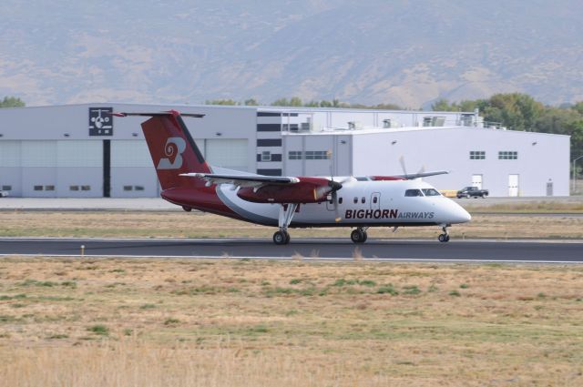 de Havilland Dash 8-100 (N990BH) - A short Dash 8 landing Runway 13 after doing a skydive ops south of the lake. br /Best viewed in full! 