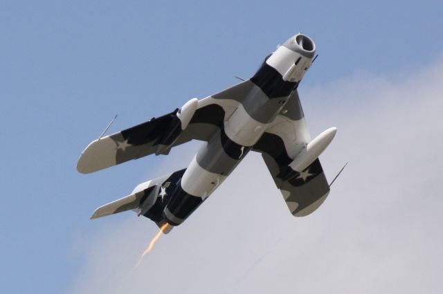 MIKOYAN MiG-17 (N9143Z) - Black Diamond Jet Team performing at the 2012 Florida International Airshow