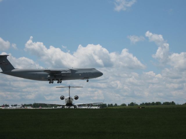 Lockheed C-5 Galaxy (07-0037) - Over the numbers...and a CRJ!