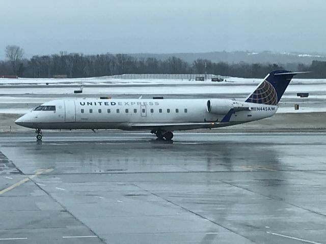 Canadair Regional Jet CRJ-200 (N445AW) - UAL flight 4814 taxiing to gate at BTV on February 4, 2019.  Photo taken from inside the BTV passenger terminal.