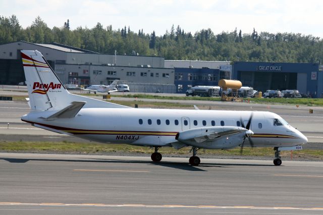 Saab 340 (N404XJ) - PenAir (Peninsula Airways), N404XJ, Saab 340BPlus, msn 340B-404,  Photo by John A. Miller, a rel=nofollow href=http://www.PhotoEnrichments.comwww.PhotoEnrichments.com/a