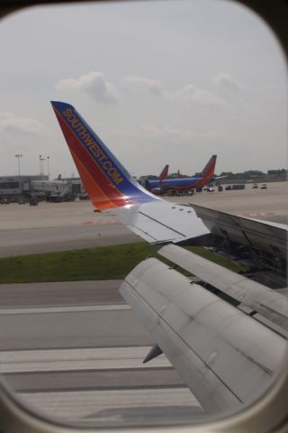 — — - Landing at Chicago Midway (MDW).