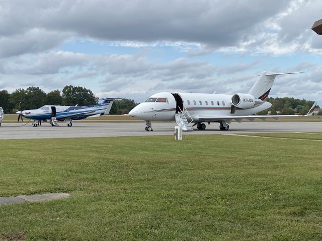 Canadair Challenger (N241QS) - Date Taken: September 28, 2023br /Sitting on the ramp with a Pilatus PC-12 (N12XN)