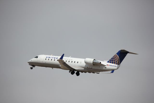 Canadair Regional Jet CRJ-200 (N961SW) - Taking off from runway 25.