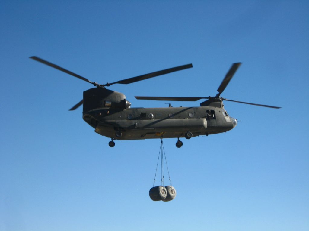 UNK — - A U.S. Army CH-47 sling loads fuel blatters to remote U.S. Firebase in Afghanistan.