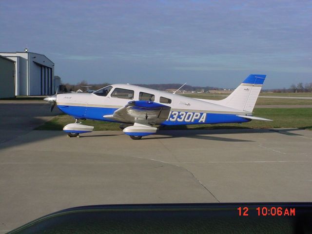 Piper Cherokee (N330PA) - Parked on ramp 12/12/09
