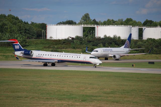 Canadair Regional Jet CRJ-700 (N725PS) - Cleared for take-off on runway 18C - 9/27/09