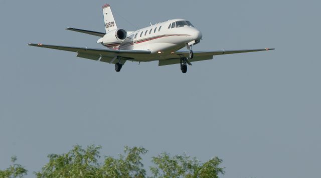 Cessna Citation Excel/XLS (N625QS) - Over the trees into Runway 19 (Cape May County Airport NJ)