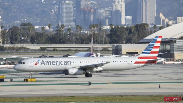 Airbus A321 (N125AA) - Taxiing for departure at LAX