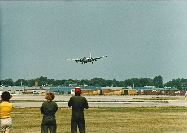 Lockheed P-2 Neptune (N14835) - P-2 landing at KOSH during the EAA Fly In