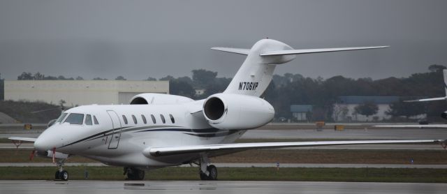 Cessna Citation X (N706VP) - Sitting on the ramp on a rainy day in Naples (02/11/2011)