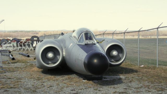 — — - Canada Aviation and Space Museum storage yard, Rockliffe, Ottawa, On. Tail number unknown. Poor sad lonely remains of Avro Canada CF-100 Canuck ("Clunk", sound of landing gear retracting) twin engine all weather fighter. Only Canadian designed and built fighter. Believed used to scavenge parts for remaining aircraft in museum. Photo taken through chain link fence. Orenda engines.