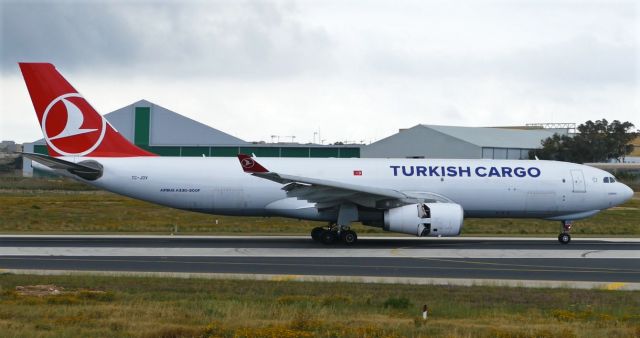 Airbus A330-200 (TC-JOV) - On landing RWY31 to load cargo