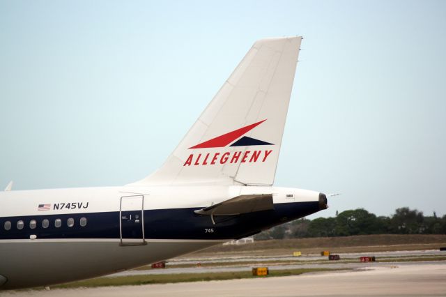Airbus A319 (N745VJ) - US Air Flight 2090 (N745VJ) "Allegheny Airlines Heritage" prepares for flight at Sarasota-Bradenton Interantional Airport