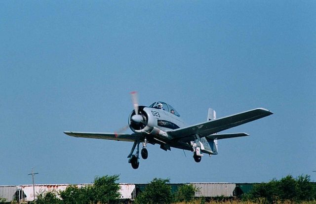 North American Trojan (NX28NB) - T-28 landing at T67