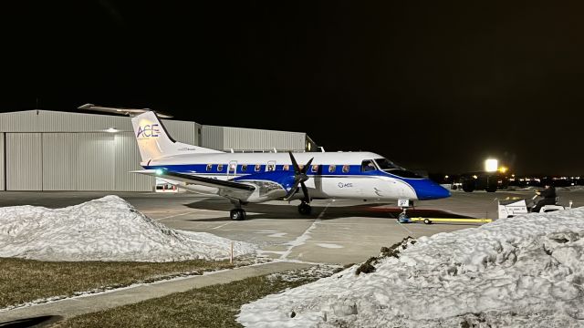 Embraer EMB-120 Brasilia (N127CZ) - N127CZ, a 1999 Embraer EMB-120ER Brasilia, being towed over to be de-iced. Operating as FRG428 tonight, and carrying Drake University Men’s Basketball team home after beating Valpo University earlier this evening. 2/23/22.  