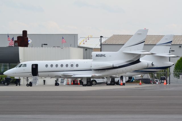 Dassault Falcon 50 (N58HL) - HRL ENTERPRISES LLC parked at FBO with a F2TH (N142JS) parked behind - 3/17/18