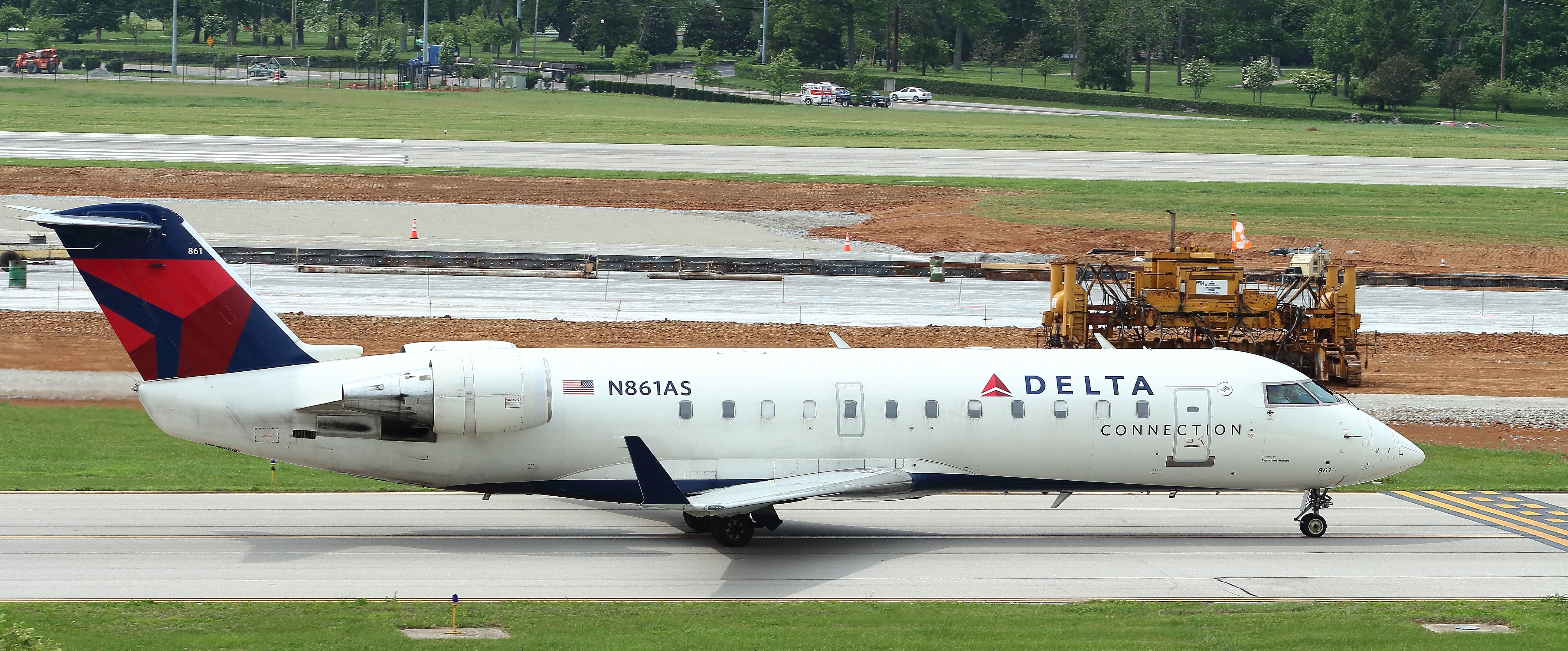 Canadair Regional Jet CRJ-200 (N861AS) - ExpressJet EV5228 Bombardier CRJ-200 taxis toward runway 22 via the old taxiway Alpha. Above you can see the new taxiway alpha being built and set to open in Sept/Oct. 2017.