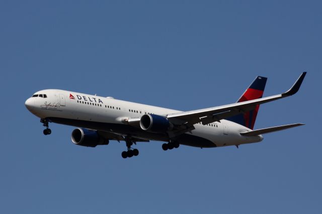 BOEING 767-300 (N16065) - Delta B767-332/ER (N16065) with “Andrew Young - Atlantas Ambassador to the World” sticker on nose arriving to Boston Logan on 4/15/17. 