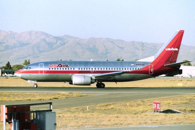 BOEING 737-300 (N365AU) - KSJC - After US Air took over PSA - I had a hard time "liking" this airline - if it wasn't for the Boeing 737-300s I'd probably boycotted their photos. This jet rolling onto 30L for departure to Pittsburg. US Air pulled out of San Jose about a year after they took over PSA....after that, K-Mart moved in and took US Air gates at Terminal A.