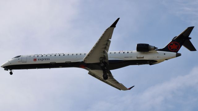 Canadair Regional Jet CRJ-900 (C-GJZS) - A Jazz Bombardier CRJ-900LR, operated for Air Canada Express, on short final @ KIND. br /br /9/20/23