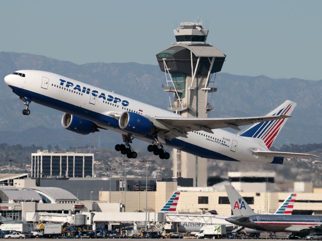 Boeing 777-200 (EI-UNW) - March 8, 2014