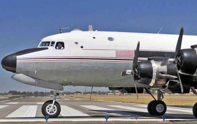 Douglas C-54 Skymaster (N460WA) - Sam making sure that he gets the maximum length of runway for takeoff at Merced Regional Airport (KMCE)